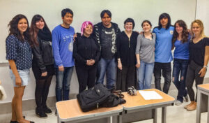 Writer LeAnn Howe standing in classroom with UDLAP students